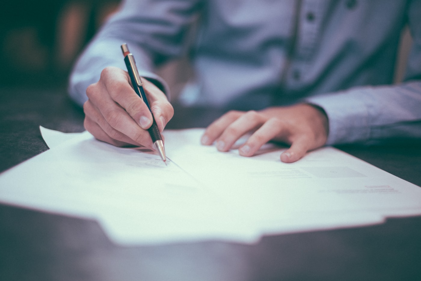 A critical deliverable marked up during internal review.