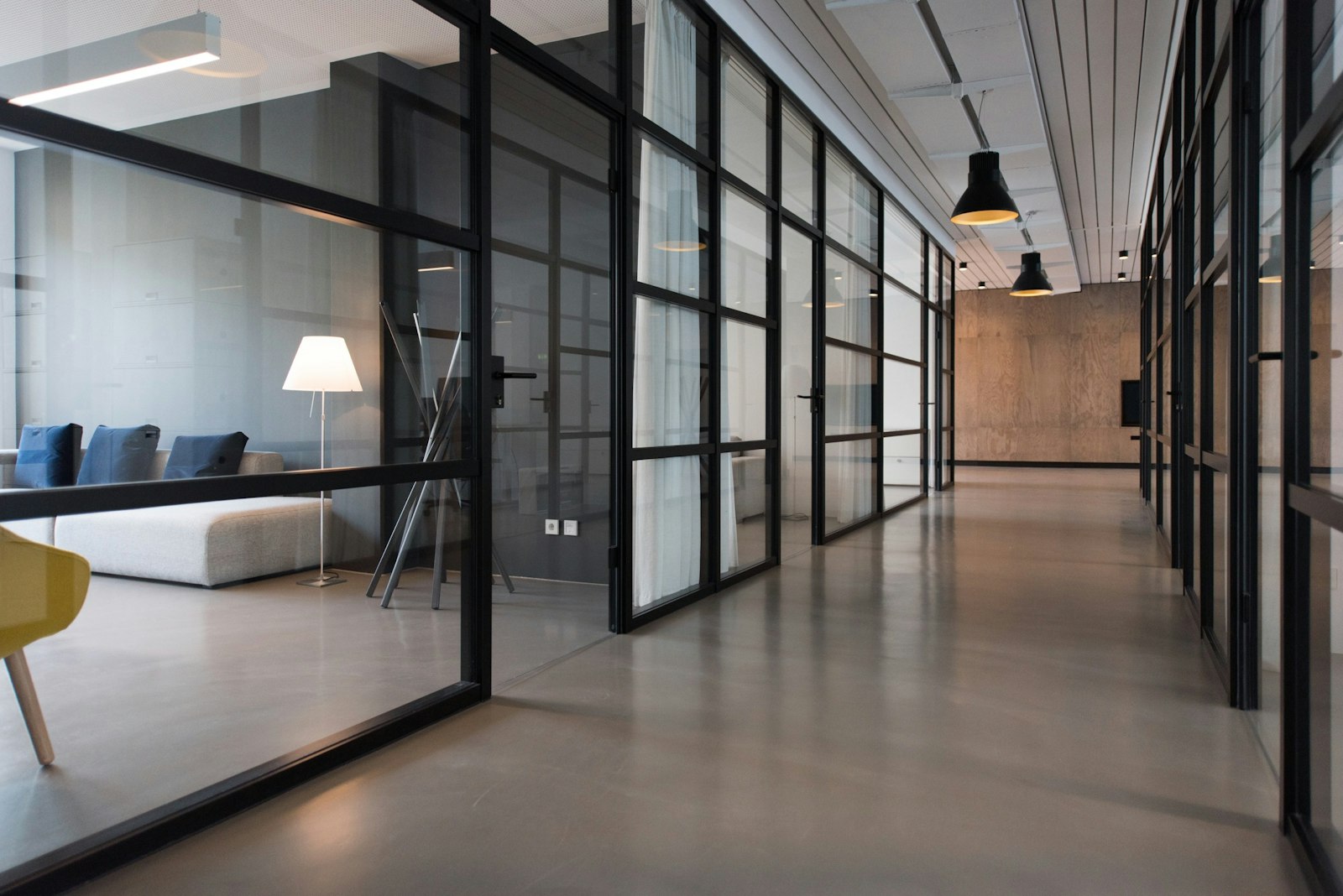 A quiet meeting room before the work is read.